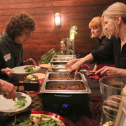 Attractive dinner selections being served by the attractive catering staff